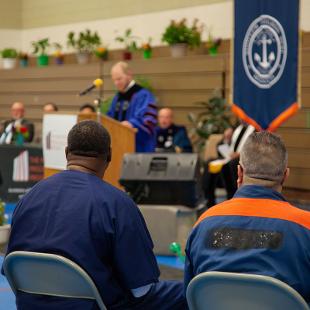 President Matt Scogin speaking at Hope-Western Prison Education Program Commencement
