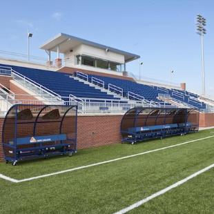 Team and spectator seating at the Van Andel Soccer Stadium