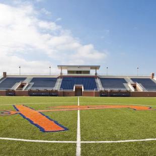 The orange and blue anchor at the center of the soccer field
